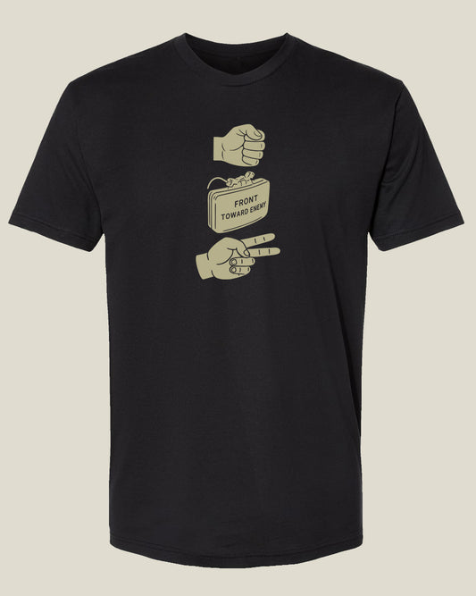 Black t-shirt with hand and Claymore explosive graphics depicting 'Rock, Claymore, Paper'