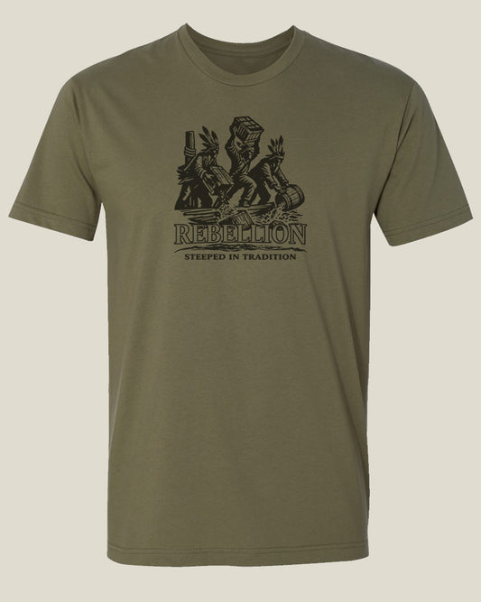olive drab t-shirt with graphic depicting settlers dressed as Native Americans throwing crates of tea overboard with large text: "Rebellion" and underneath the text: "Steeped in Tradition."
