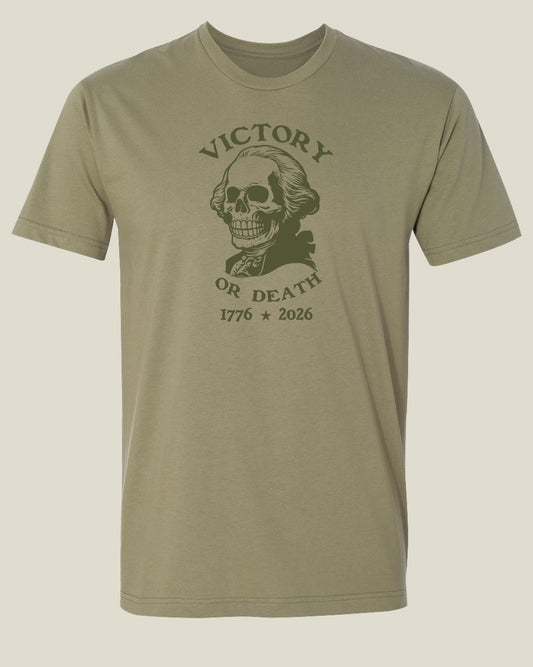 Ranger green t-shirt with a graphic design featuring a George Washington skull and text 'Victory or Death' and '1776-2026]